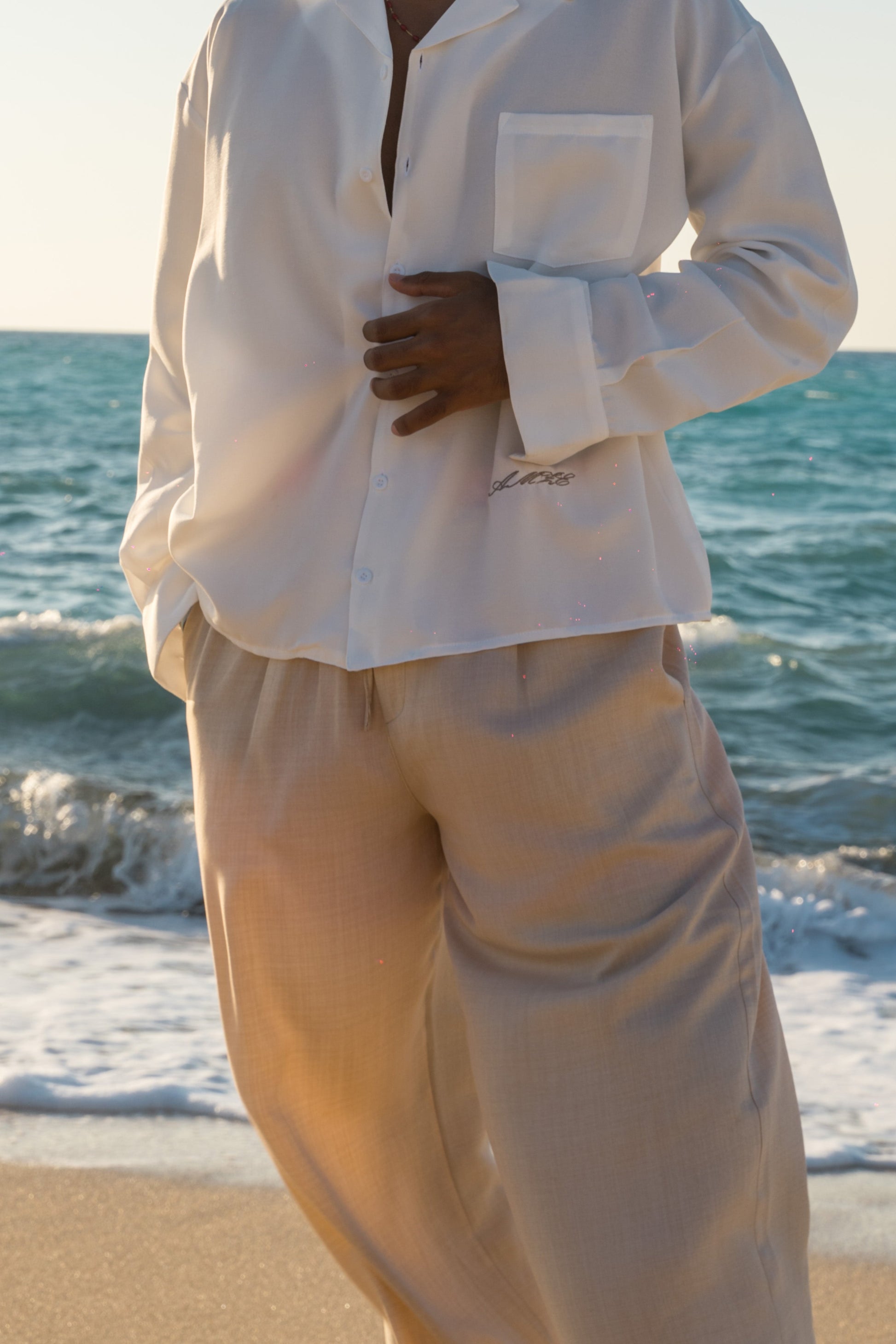 BEIGE PLEATED LINEN PANTS